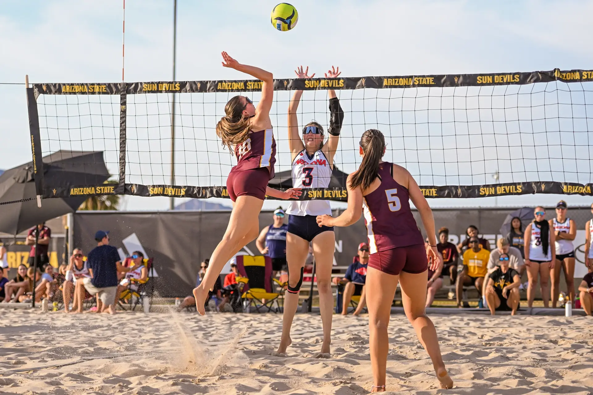 Arizona State volleyball player attacking over the block against Arizona during the 2026 season