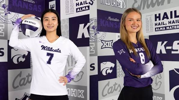 Two Kansas State Wildcats volleyball players posing in white and purple jerseys ahead of a Big 12 match against Kansas in 2026
