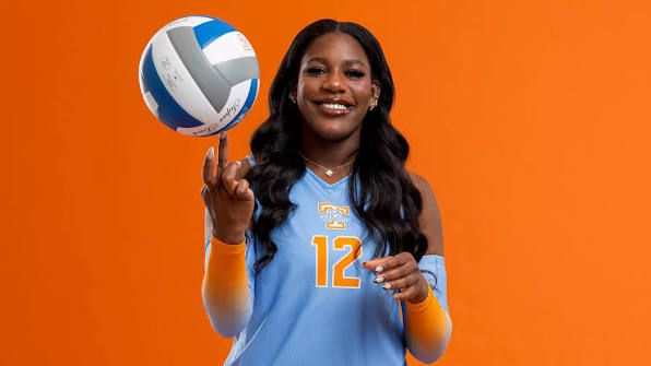 Tennessee Lady Vols volleyball player spinning a volleyball on her finger in a light blue No. 12 uniform ahead of the 2026 season