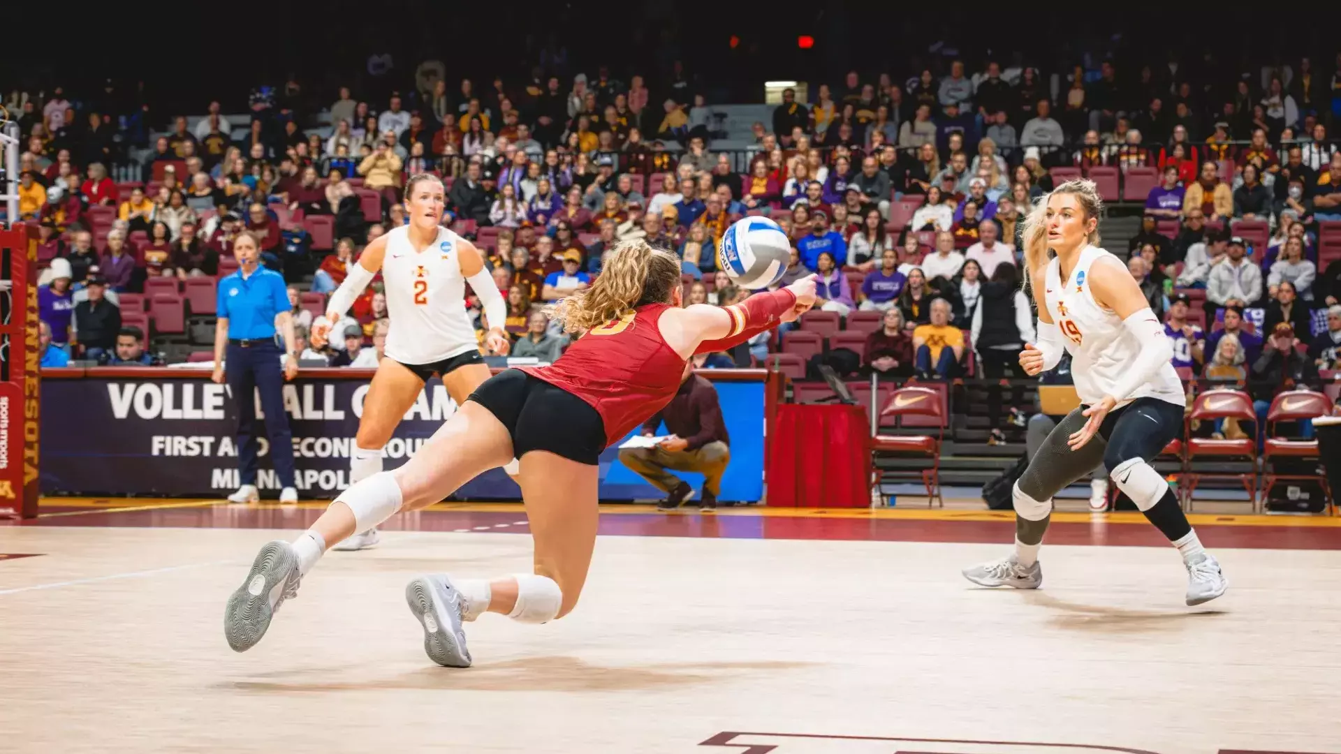 Iowa State volleyball libero diving to keep a rally alive during a 2026 season NCAA Tournament match