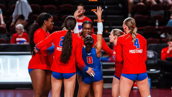 SMU Mustangs volleyball players huddling and celebrating a point during the 2026 season