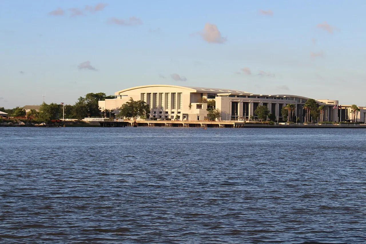 The Savannah River with the Savannah Convention Center and waterfront buildings on the opposite bank.